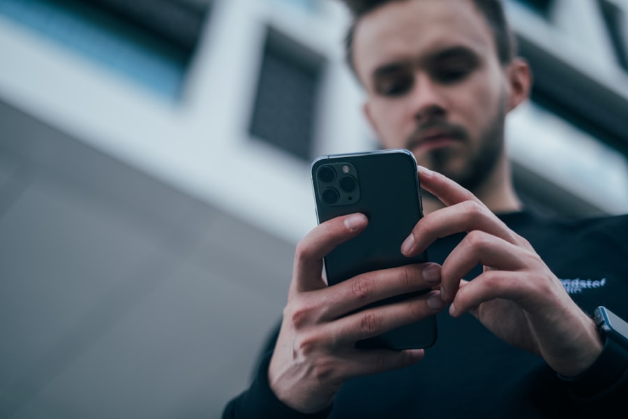 Person messaging on smartphone